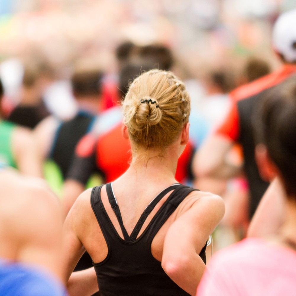 A lady running in the Great North Run